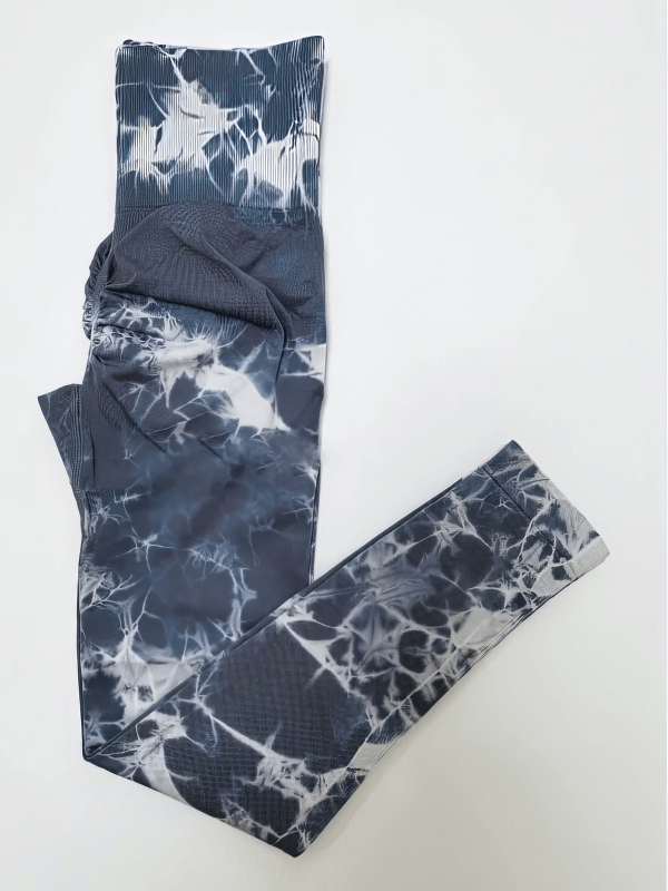 Marble-patterned seamless blue leggings with a push-up effect, featuring a high waist and ankle-length style for women's casual wear.